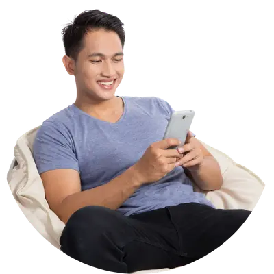 young man siting and looking his phone in NeverFail Dating