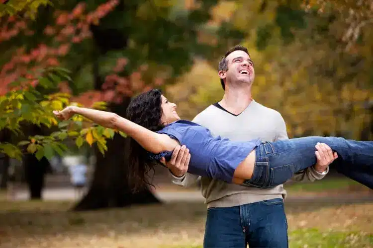 happy couple relationship in the park in NeverFail Dating